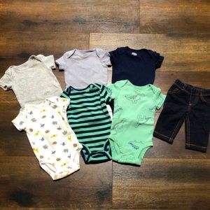 6 mix and match onesies by Cater’s and 1 pair of baby jeggings, size 3 months